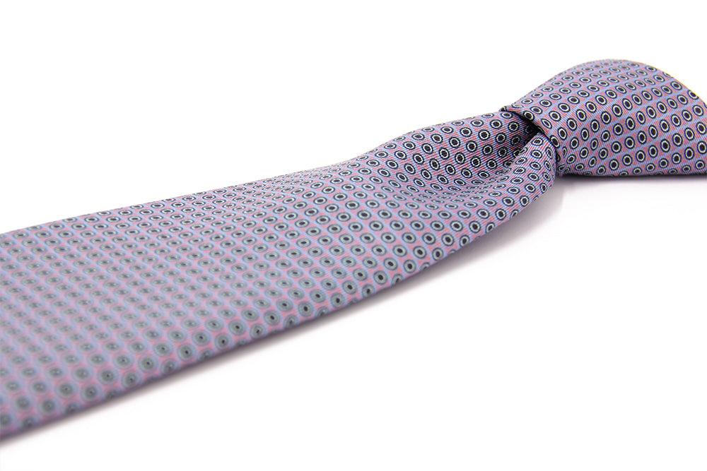 A patterned silk tie with a combination of violet and black colors, displayed in a folded and unfolded configuration.
