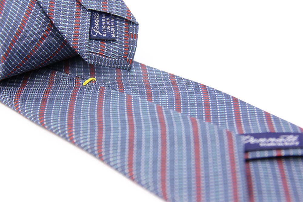 Detail of a geometric silk tie
