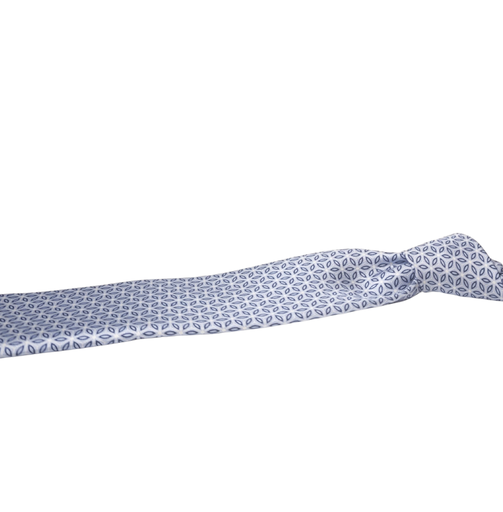 Blue patterned silk tie on a white background