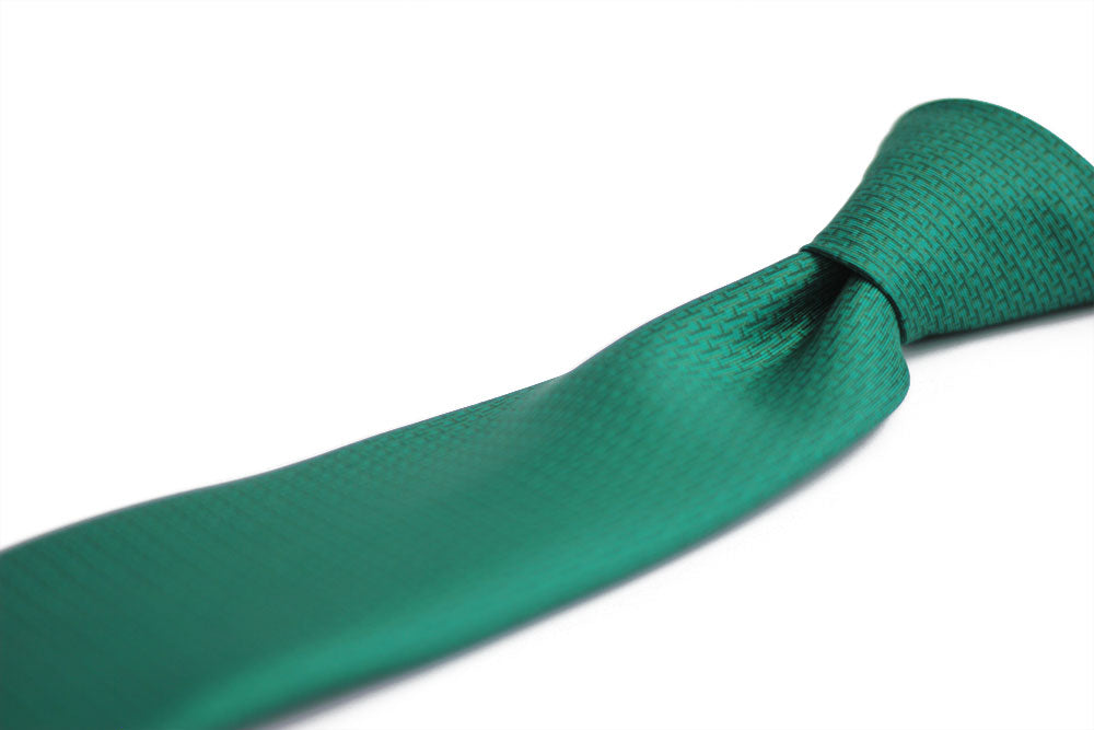 A green necktie with a cross-hatched pattern, displayed on a plain background.