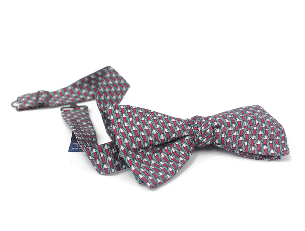 A multicolored geometric patterned bow tie displayed on a white background.