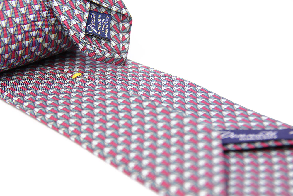 A striped silk tie with a combination of pink and white colors, displayed in a folded and unfolded configuration.