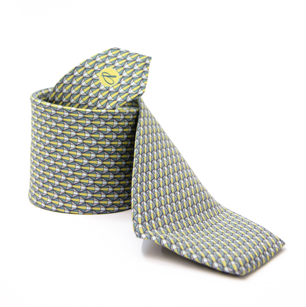 A yellow and green striped silk necktie with a patterned texture, displayed in a folded state.