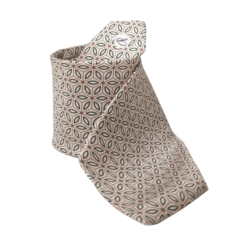 Patterned designers silk tie, hand made in Italy, on a white background