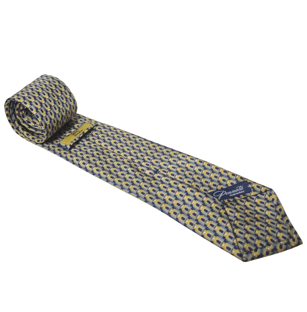 Patterned gold blue silk tie with brand logo on a white background
