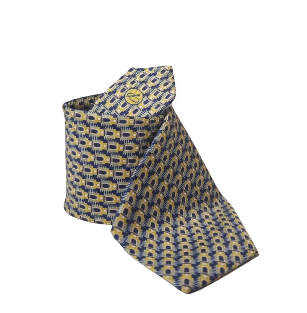 Patterned 100% silk tie with blue and gold design on a white background, handcrafted in Italy 