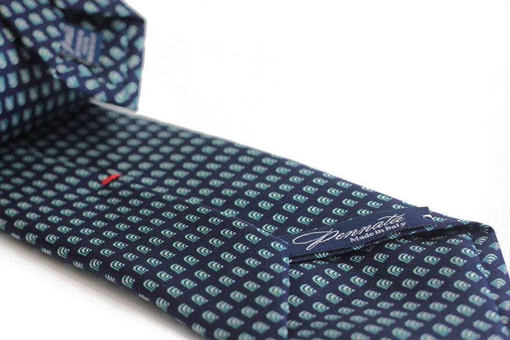 Detail of a geometric blue silk tie