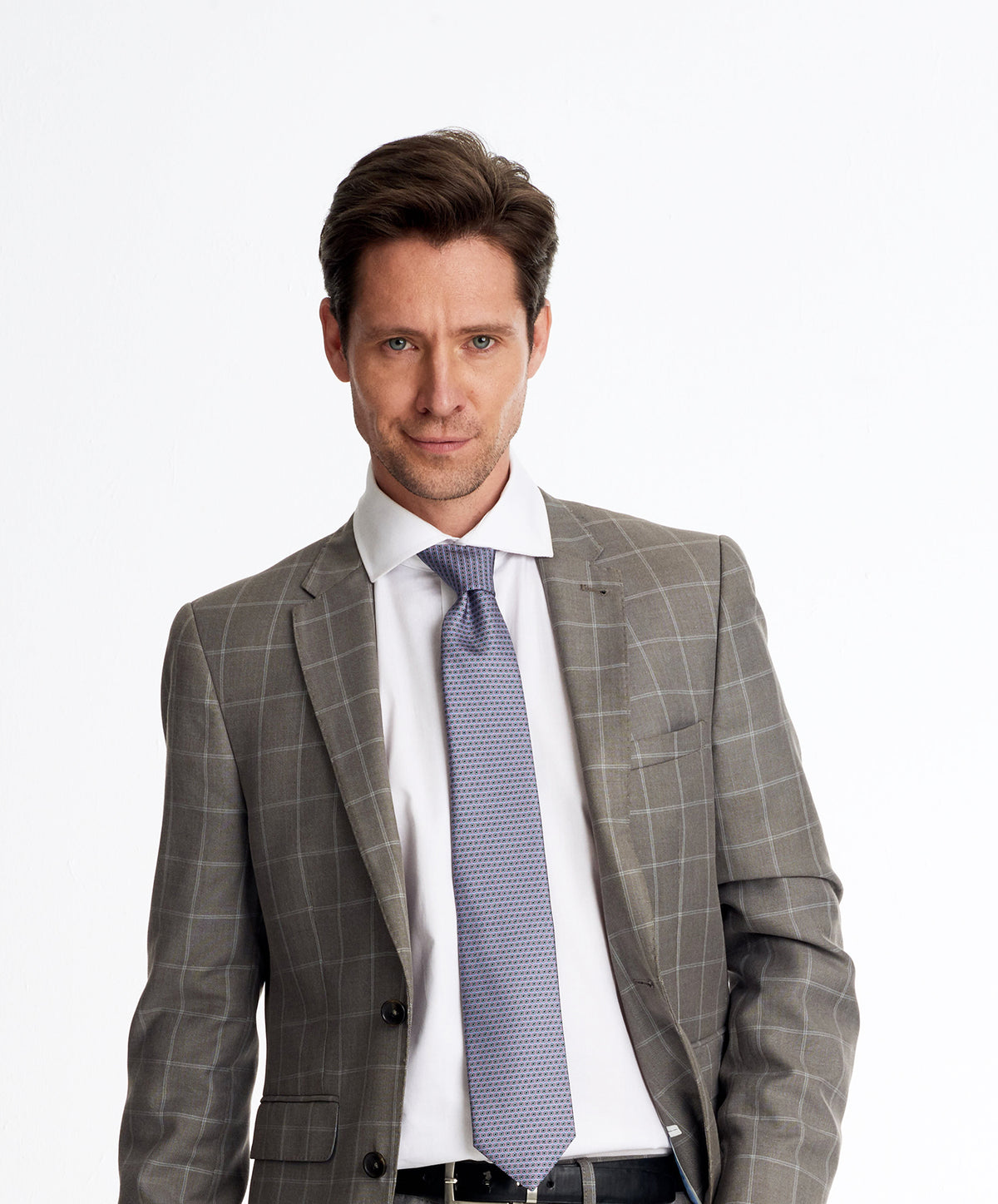 Man wearing a designers geometric silk tie 