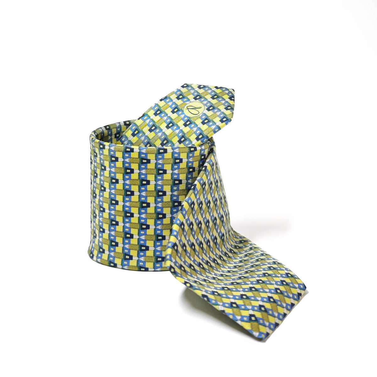 Yellow and blue patterned silk tie on a white background